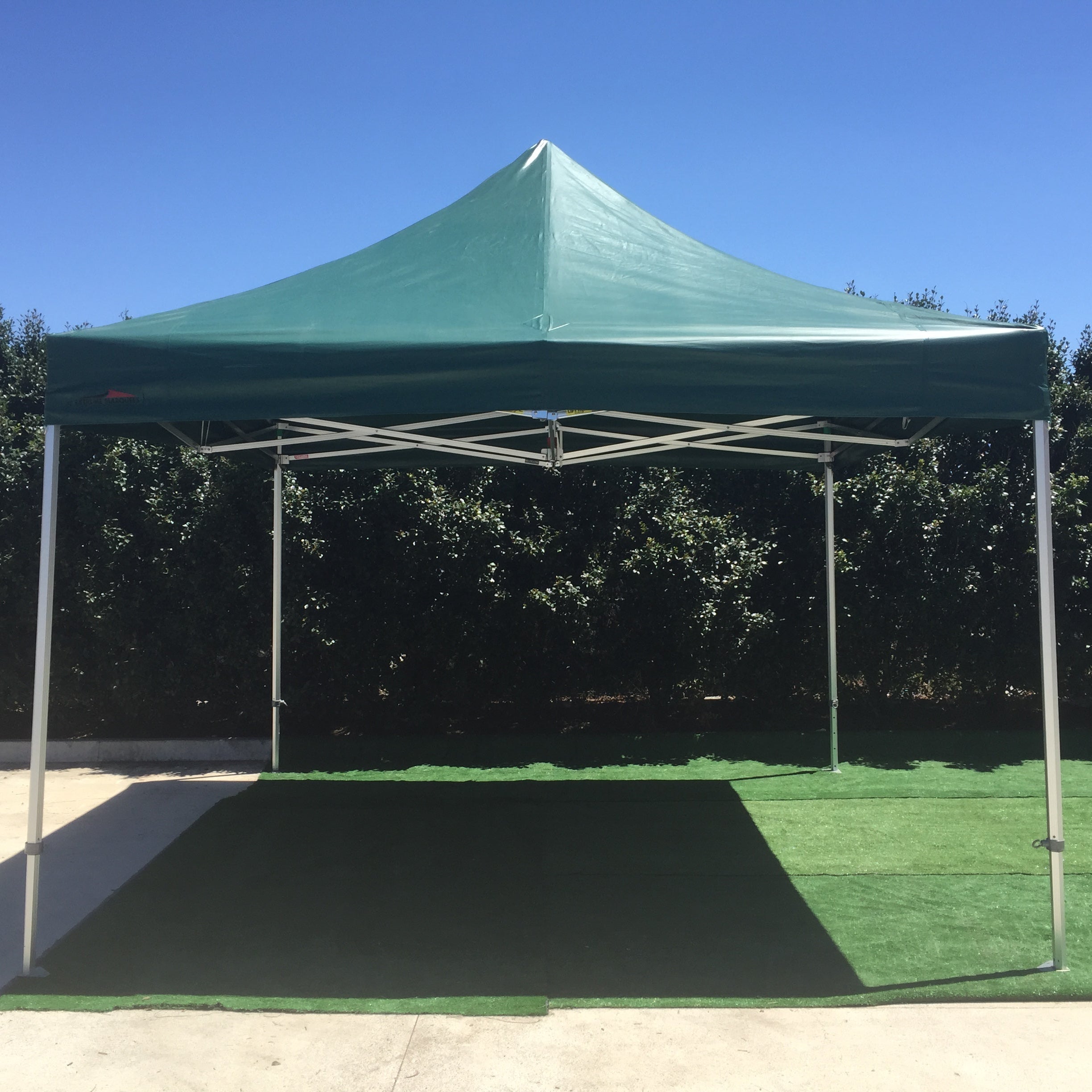 Green 4x4m pop-up canopy tent set up outdoors