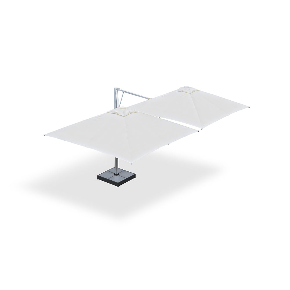 10' x 10' Multi Shade custom cantilever umbrella with two white pods and a steel base with marble weights